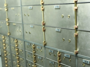 Safe deposit box with gold hardware and numbers