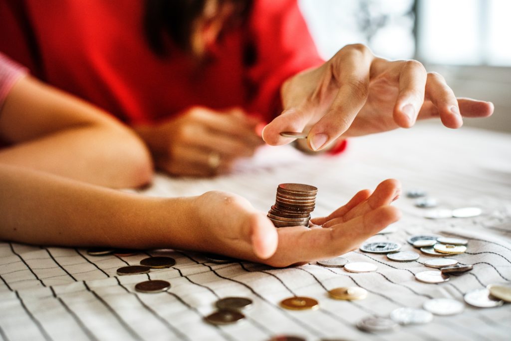 couple counting changeat a table